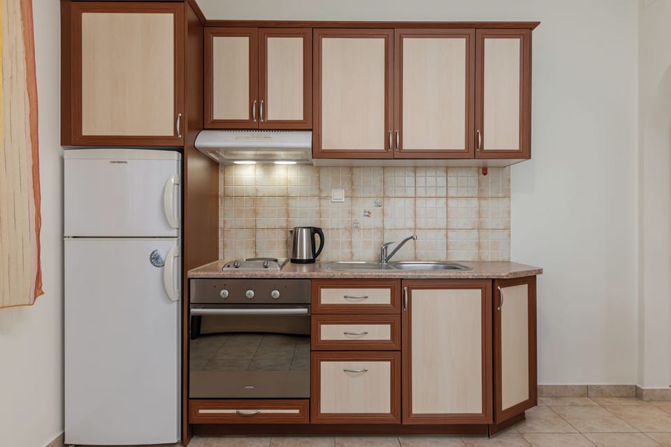 Apartment, Balcony, Partial Sea View | Private kitchen | Fridge, oven, stovetop, coffee/tea maker