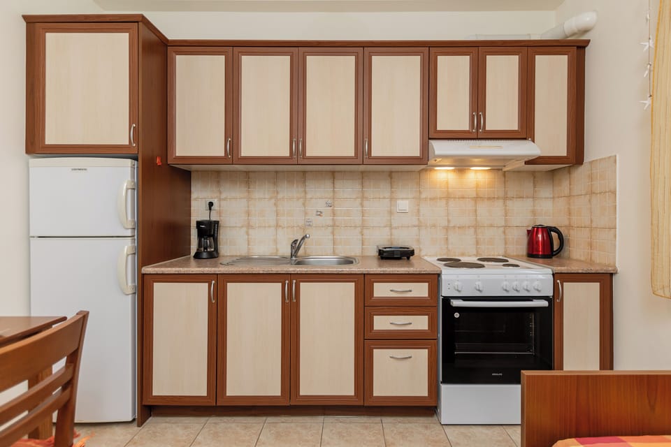 Apartment, Balcony, Partial Sea View | Private kitchen | Fridge, oven, stovetop, coffee/tea maker