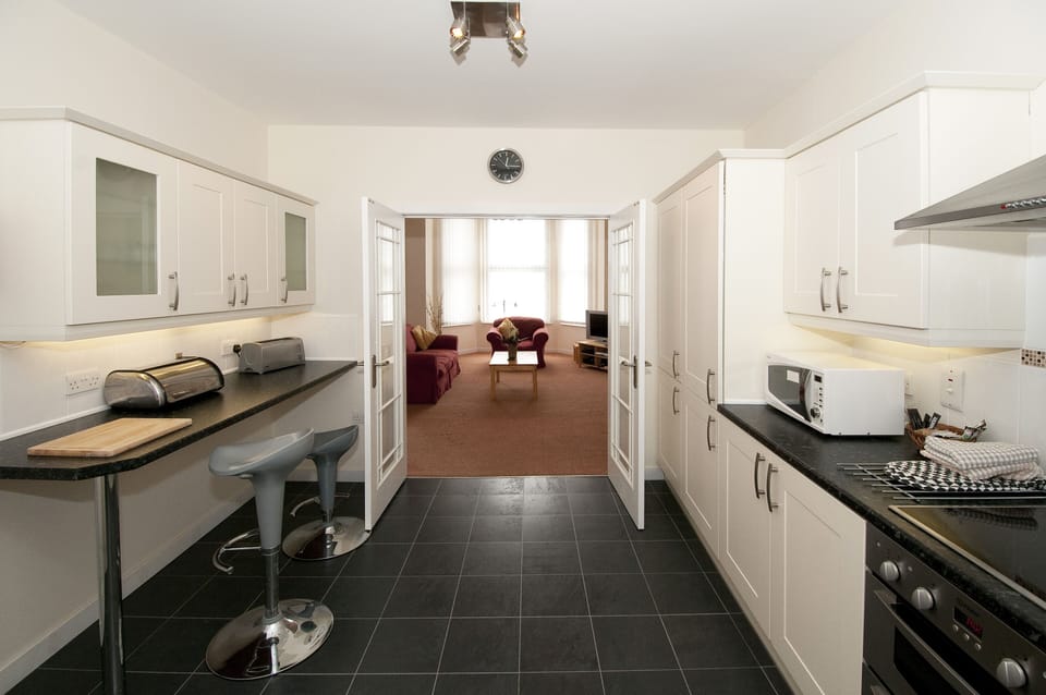 Apartment, 2 Bedrooms | Private kitchen | Full-size fridge, microwave, oven, stovetop