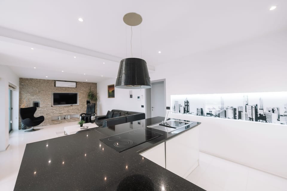 Superior Apartment | Living area | Flat-screen TV