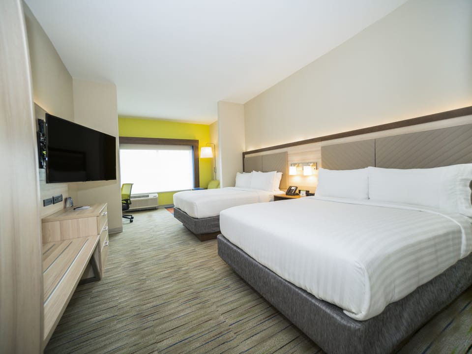 Hypo-allergenic bedding, pillowtop beds, in-room safe, desk