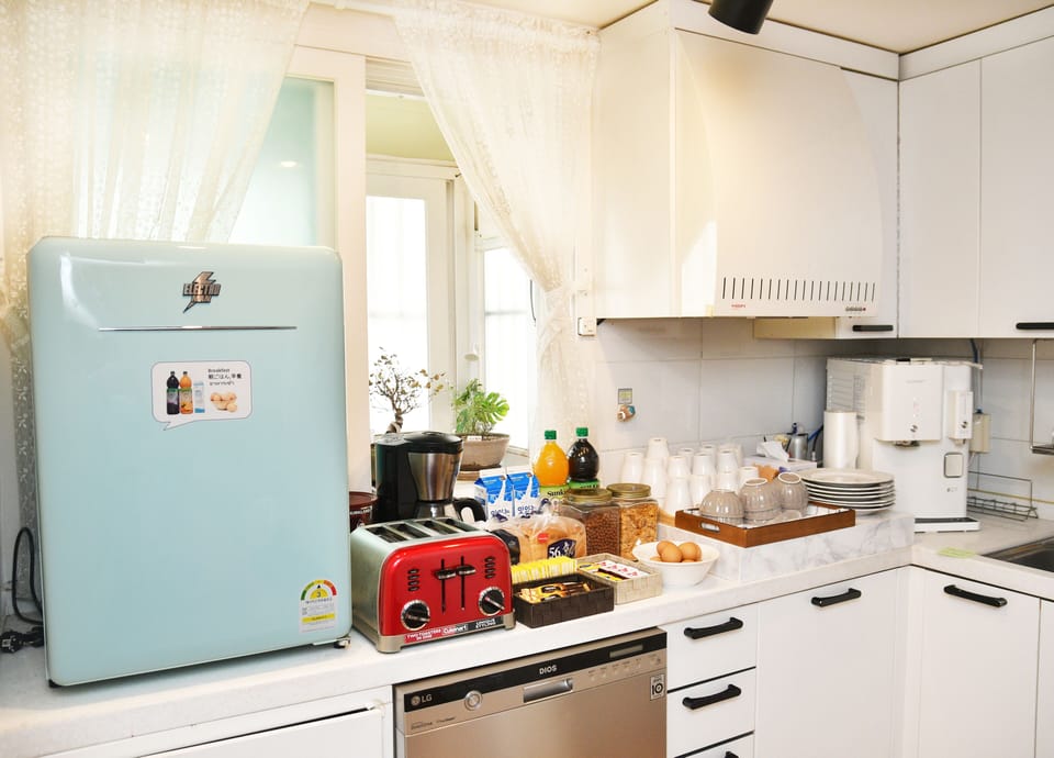 Mini-fridge, microwave, toaster, cookware/dishes/utensils