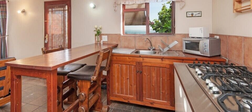 Self Catering Unit | Private kitchen | Fridge, coffee/tea maker, electric kettle
