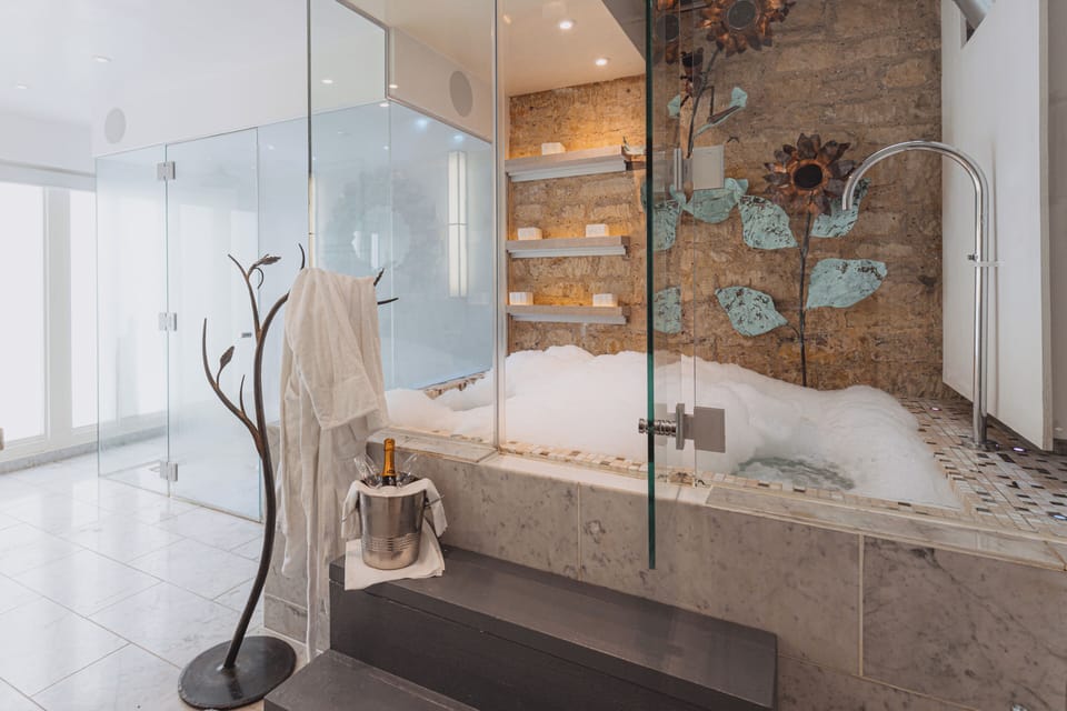 Suite (Hideout) | Bathroom | Designer toiletries, hair dryer, bathrobes, towels