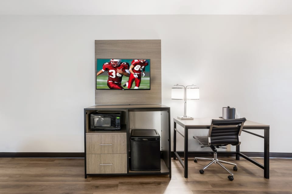 Deluxe Room, 2 Queen Beds (Smoke Free) | Desk, laptop workspace, blackout drapes, iron/ironing board