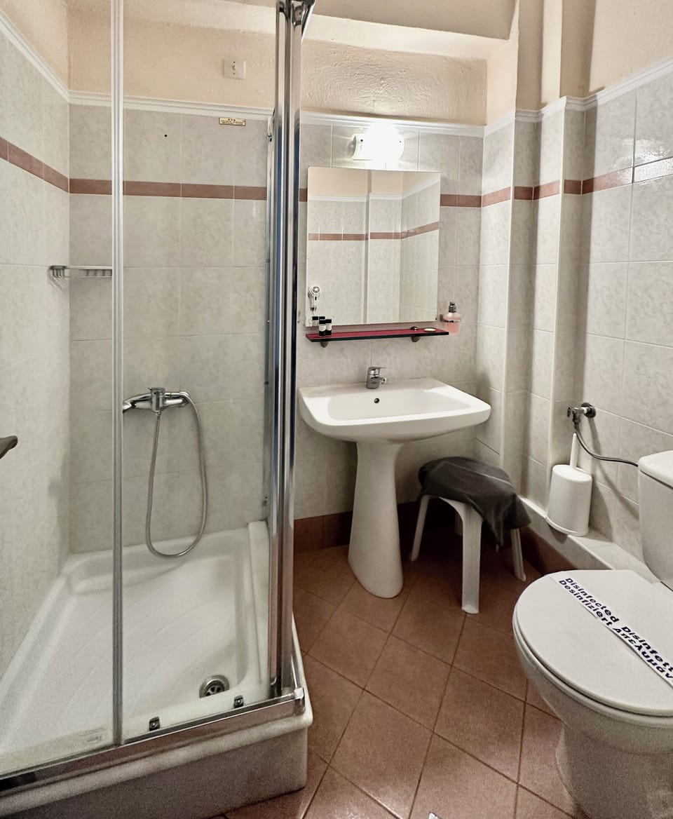Shower, free toiletries, hair dryer, towels