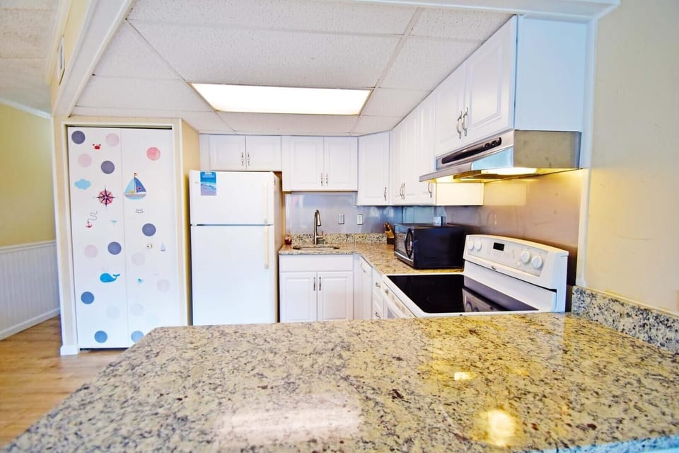 Condo, 1 Bedroom | Private kitchen | Full-size fridge, microwave, stovetop, dishwasher