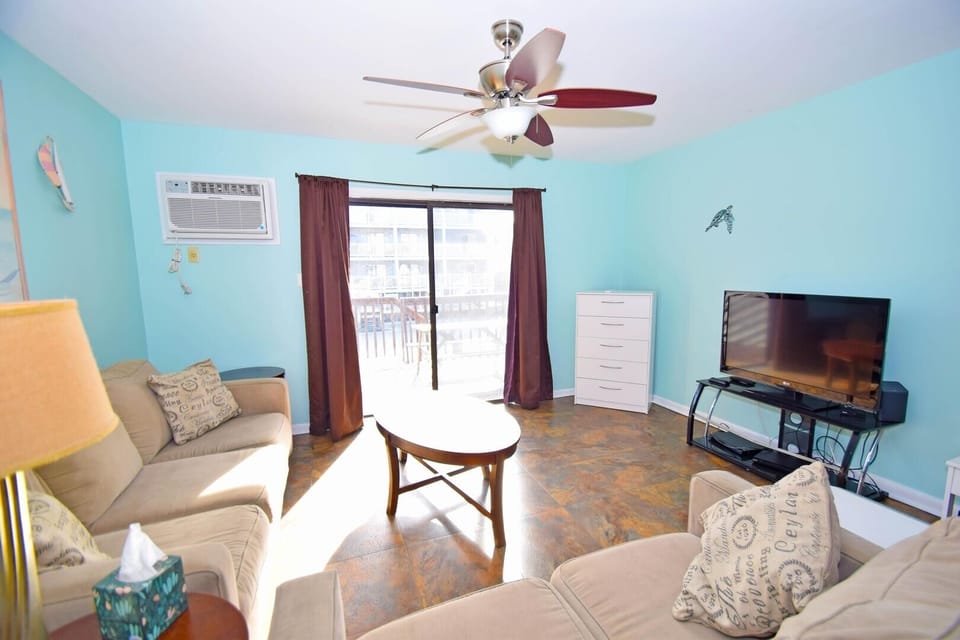 Townhome, 3 Bedrooms | Living area | TV, DVD player