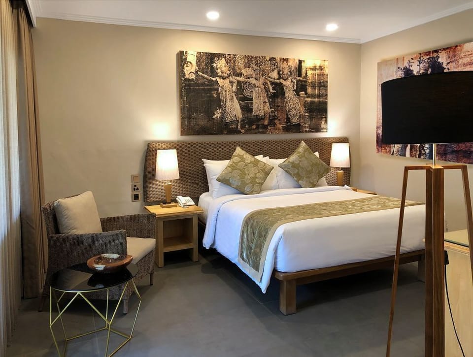 Classic Room (Near Beach Pool) | Minibar, in-room safe, individually decorated, individually furnished