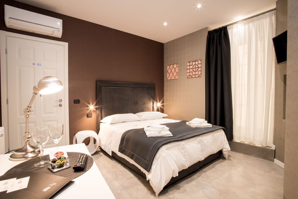 Double or Twin Room | Down comforters, minibar, in-room safe, desk