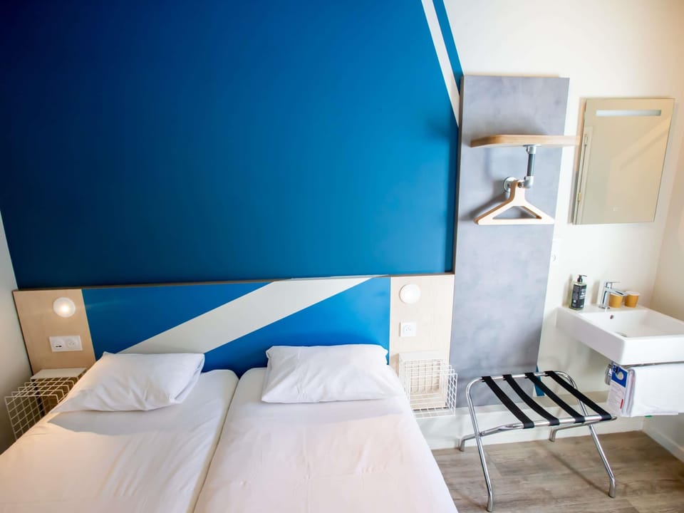 Twin Room, 2 Twin Beds | In-room safe, desk, soundproofing, free cribs/infant beds