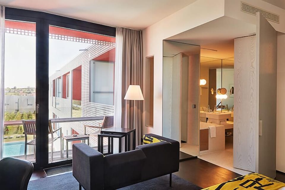 Premium bedding, down comforters, memory foam beds, minibar