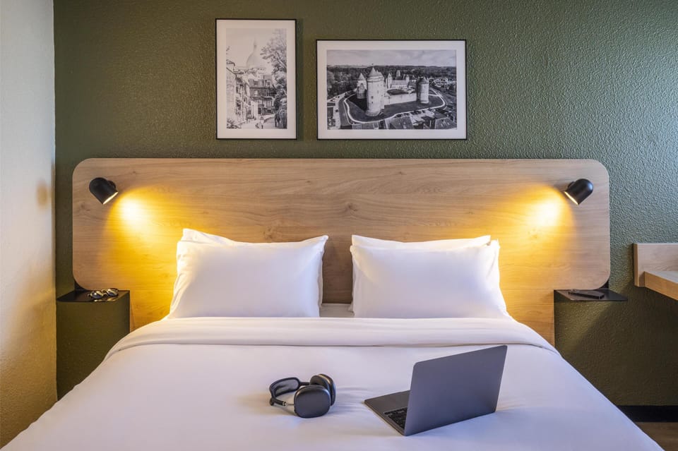 Premium bedding, desk, blackout drapes, iron/ironing board