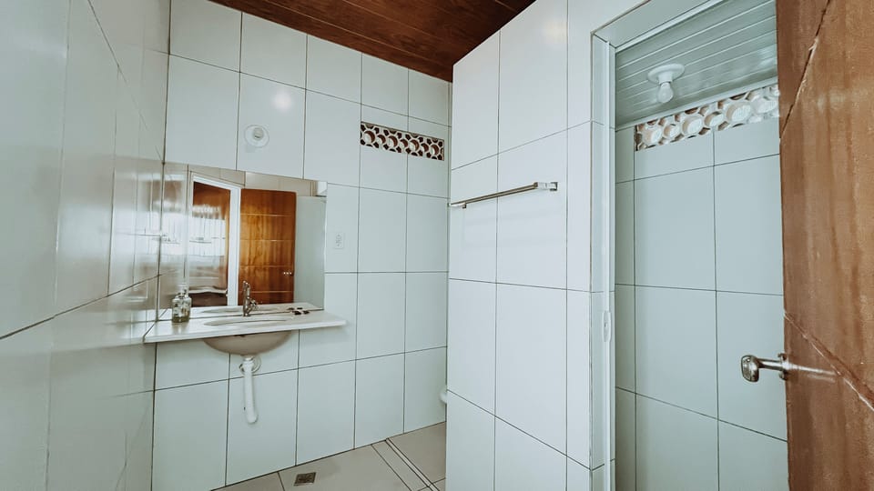 Standard Quadruple Room | Bathroom | Shower, towels, toilet paper