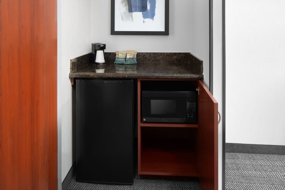 Premium bedding, down comforters, in-room safe, desk