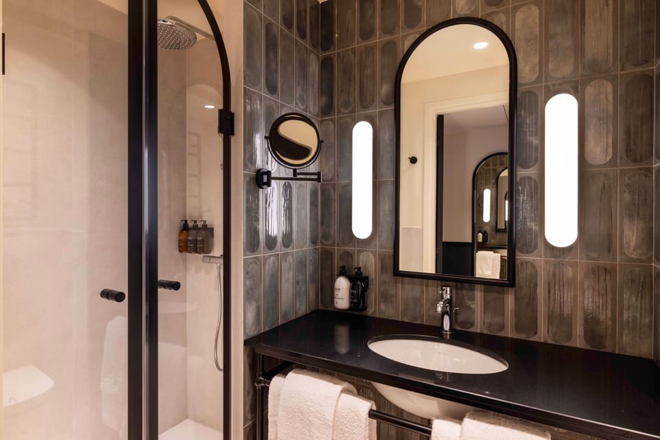 Double Room | Bathroom | Eco-friendly toiletries, hair dryer, bathrobes, slippers
