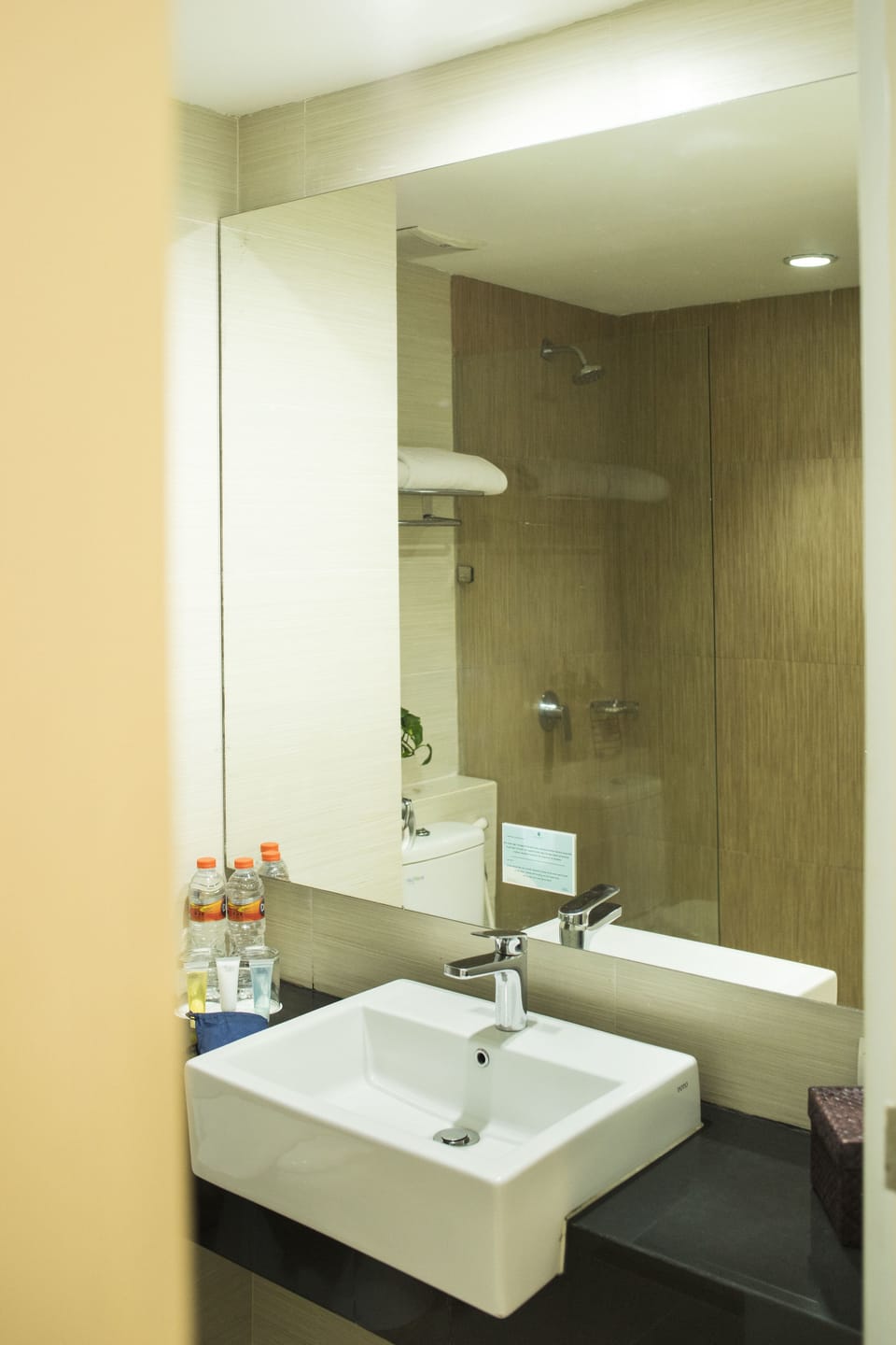 Shower, free toiletries, slippers, towels