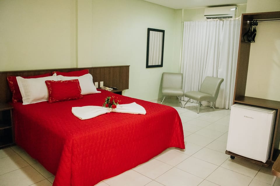Honeymoon Double Room | Minibar, desk, blackout drapes, iron/ironing board (on request)