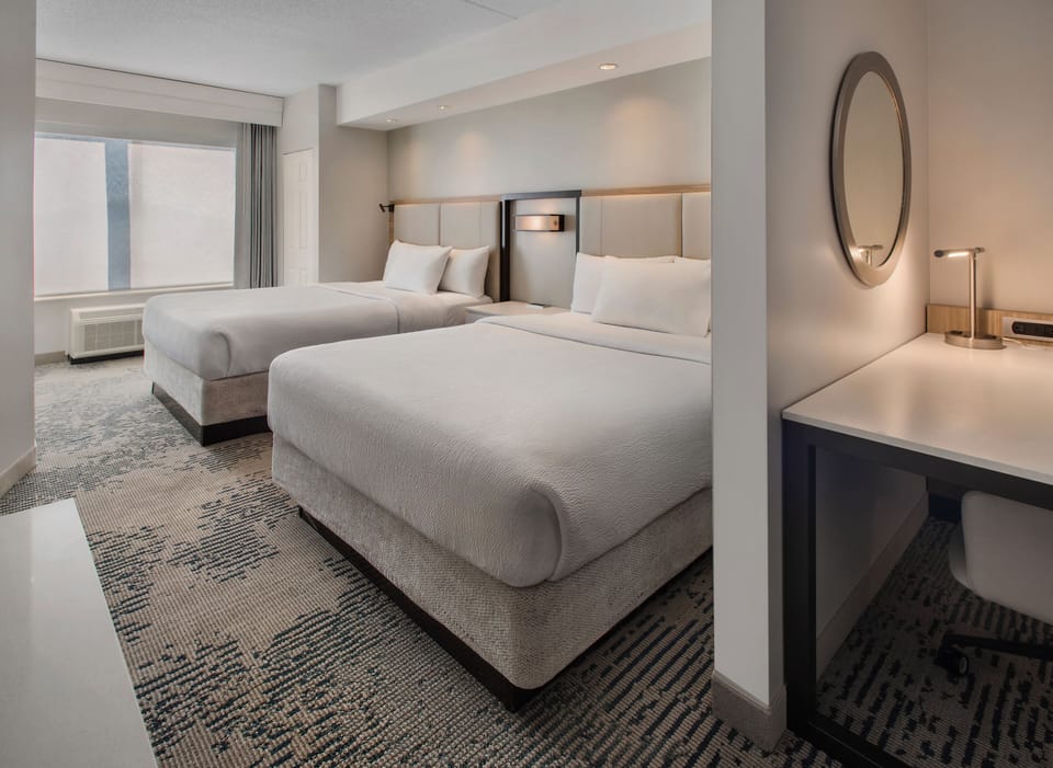 Premium bedding, desk, blackout drapes, iron/ironing board