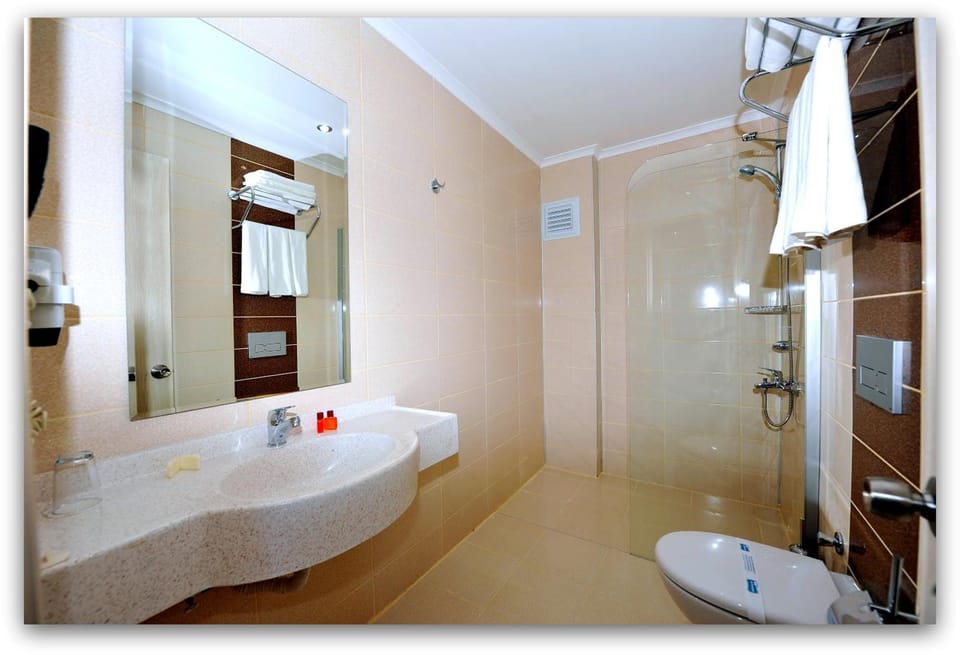 Shower, free toiletries, hair dryer, towels
