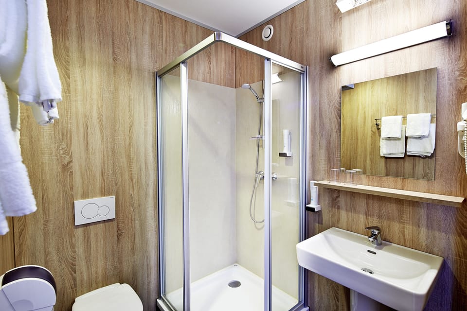 Shower, free toiletries, hair dryer, bathrobes