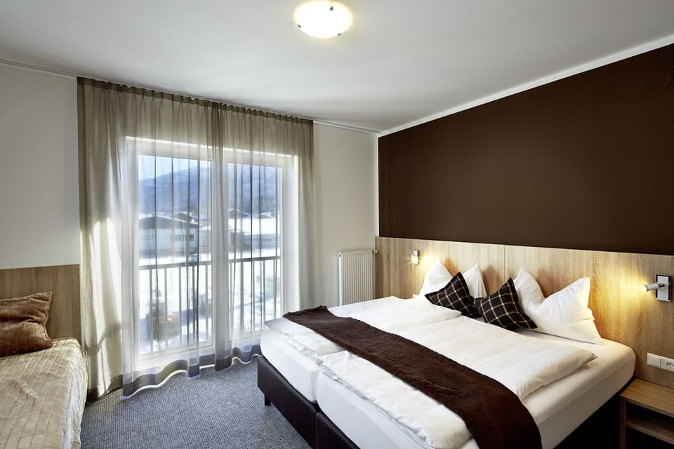 Comfort Room, 1 Bedroom, Resort View, Courtyard Area | In-room safe, desk, soundproofing, iron/ironing board