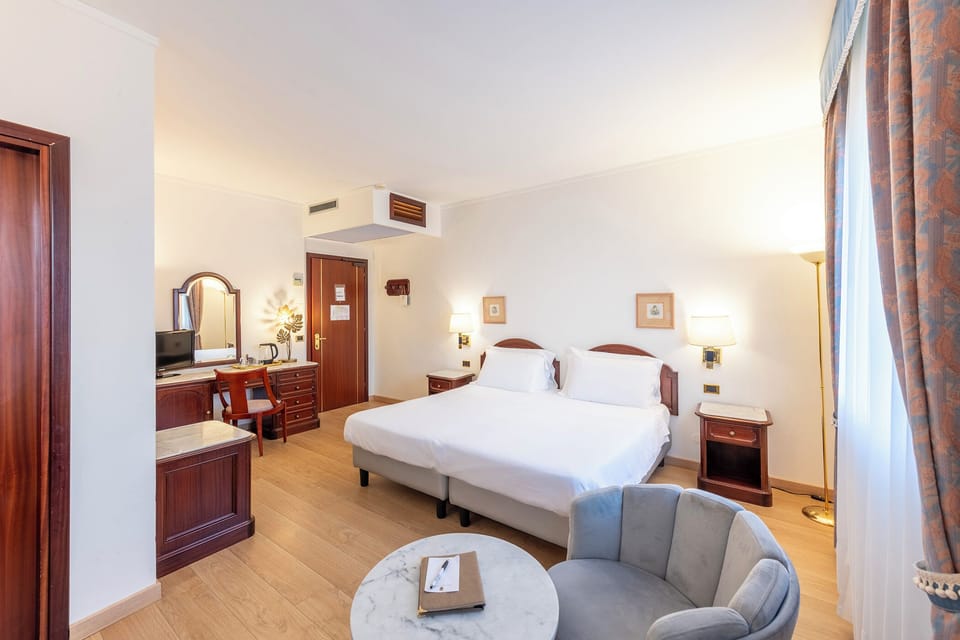 Junior Suite | Premium bedding, minibar, in-room safe, individually decorated