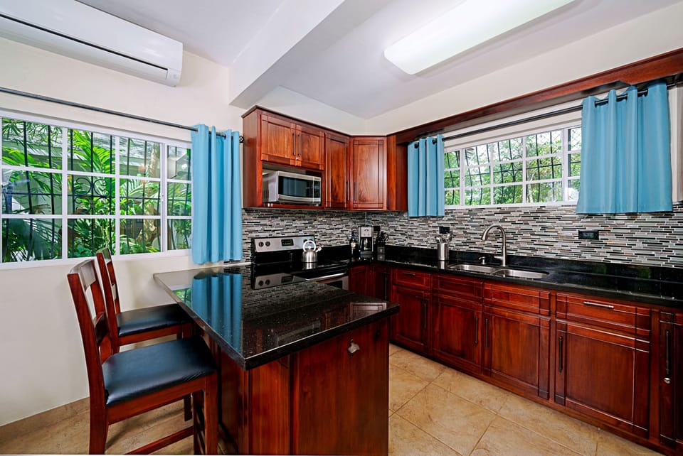 Garden House Apartment III | Private kitchen | Coffee/tea maker, full-size fridge, microwave, oven