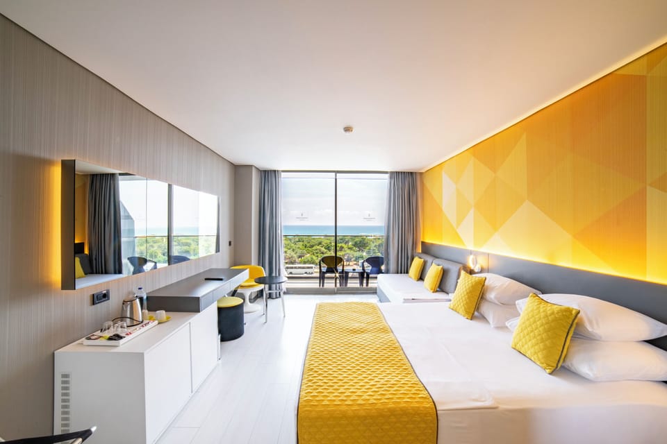 Standard Room, Partial Sea View | Premium bedding, minibar, in-room safe, desk