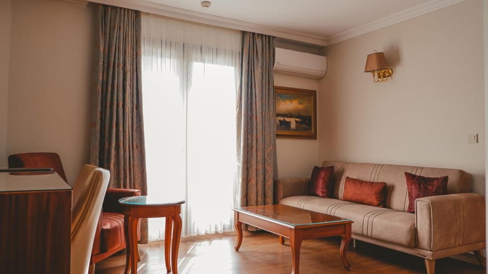 Standard Room, City View | Living room | LCD TV