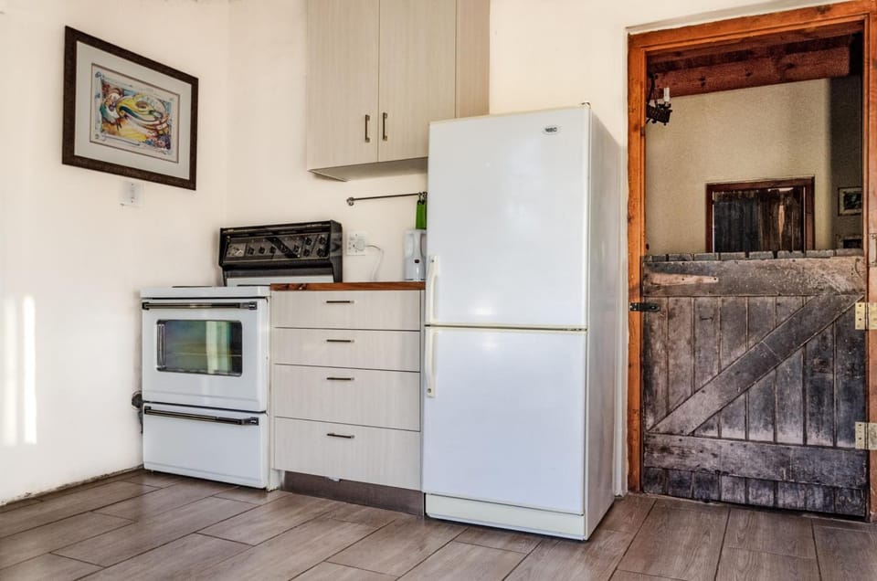 Fridge, stovetop, coffee/tea maker, cookware/dishes/utensils