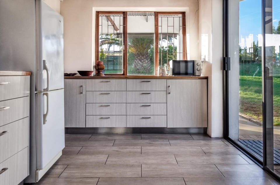 Fridge, stovetop, coffee/tea maker, cookware/dishes/utensils