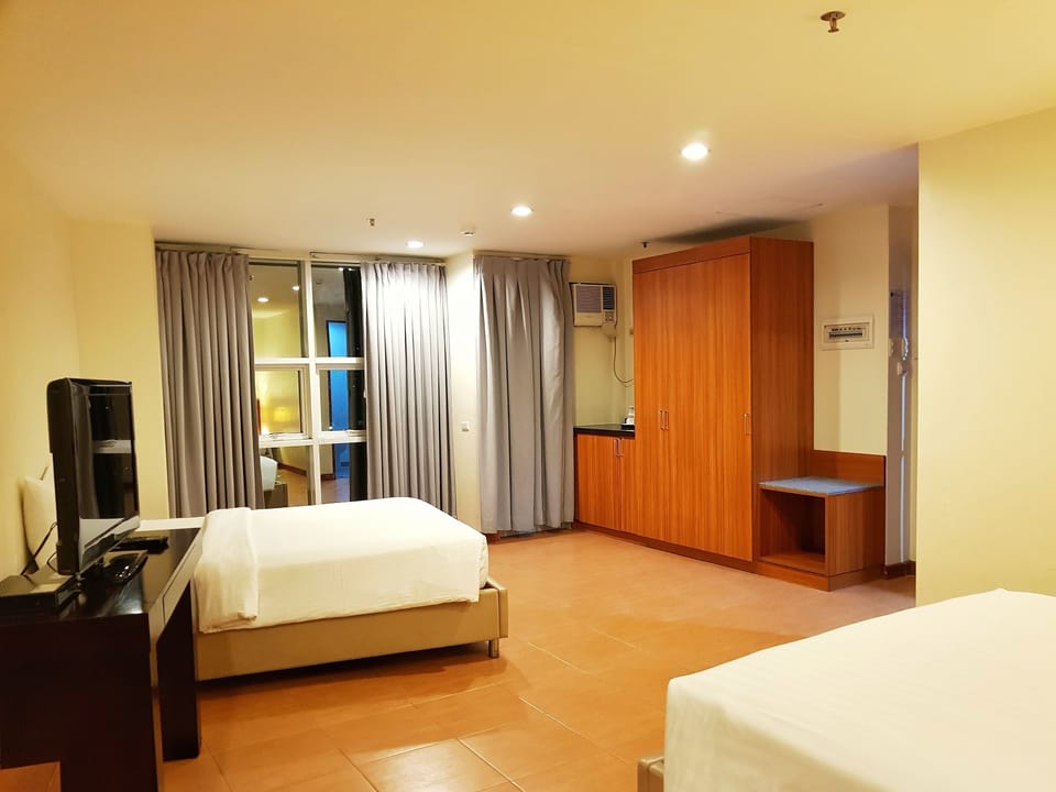 Family Room | Premium bedding, desk, blackout drapes, free WiFi