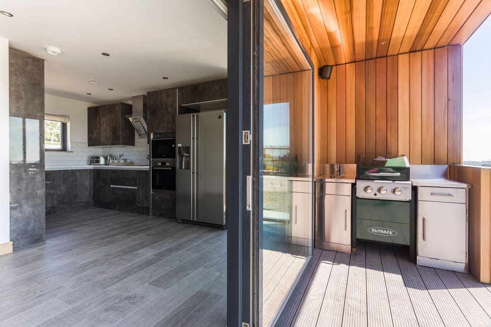Executive Suite, 1 King Bed, Hot Tub | Private kitchen | Full-size fridge, microwave, oven, stovetop