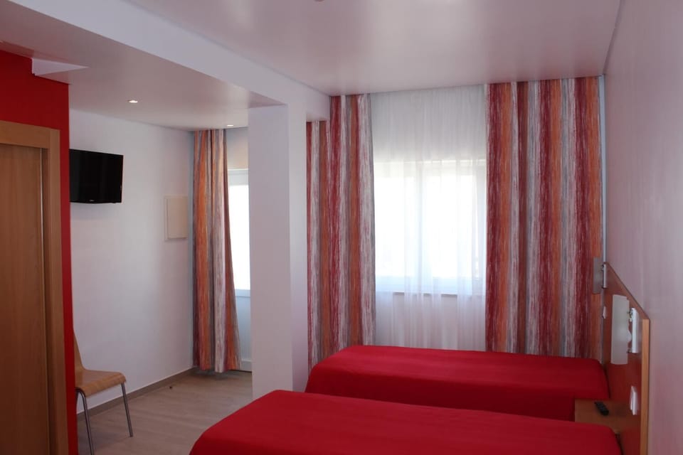 Blackout drapes, free WiFi, bed sheets