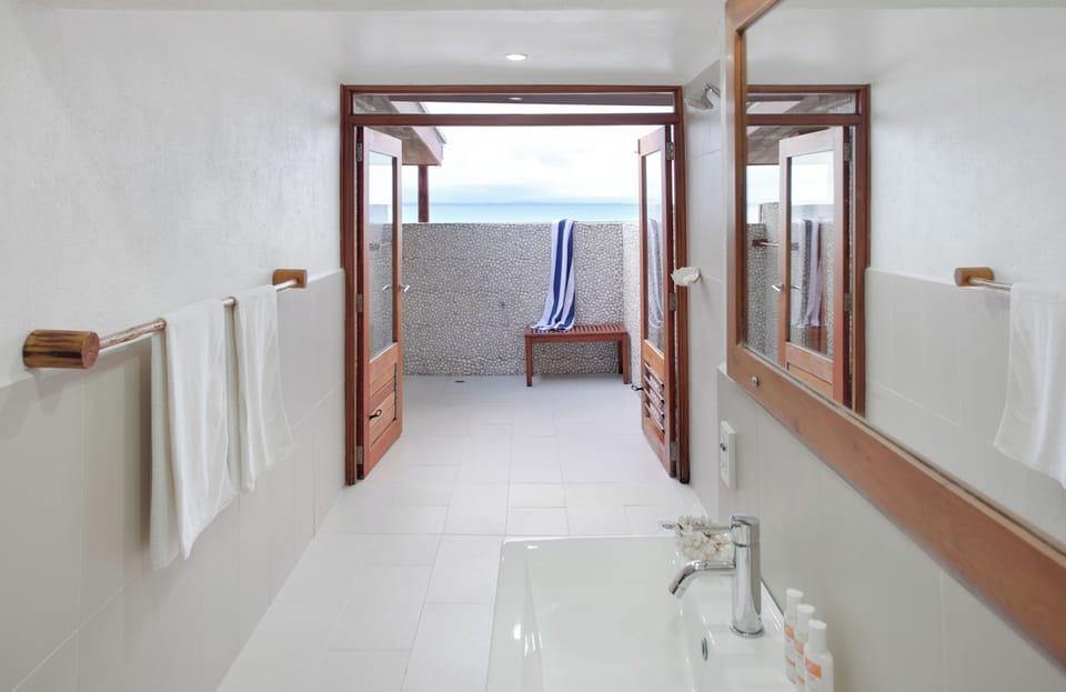 Premium Double Room, Ocean View, Beachfront | Bathroom | Shower, free toiletries, hair dryer, towels