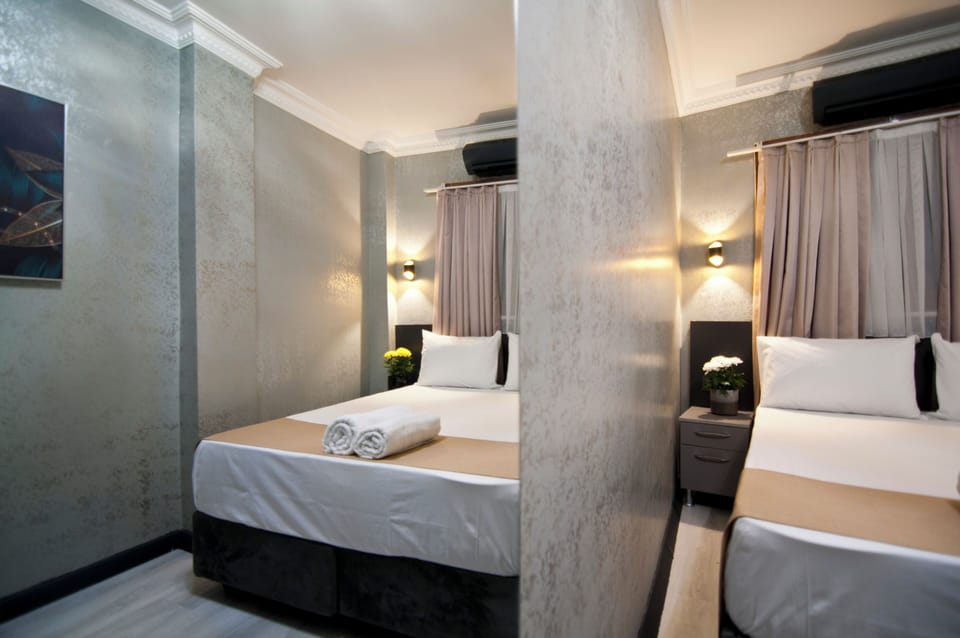 Economy Double Room | Bathroom | Shower, free toiletries, hair dryer, slippers