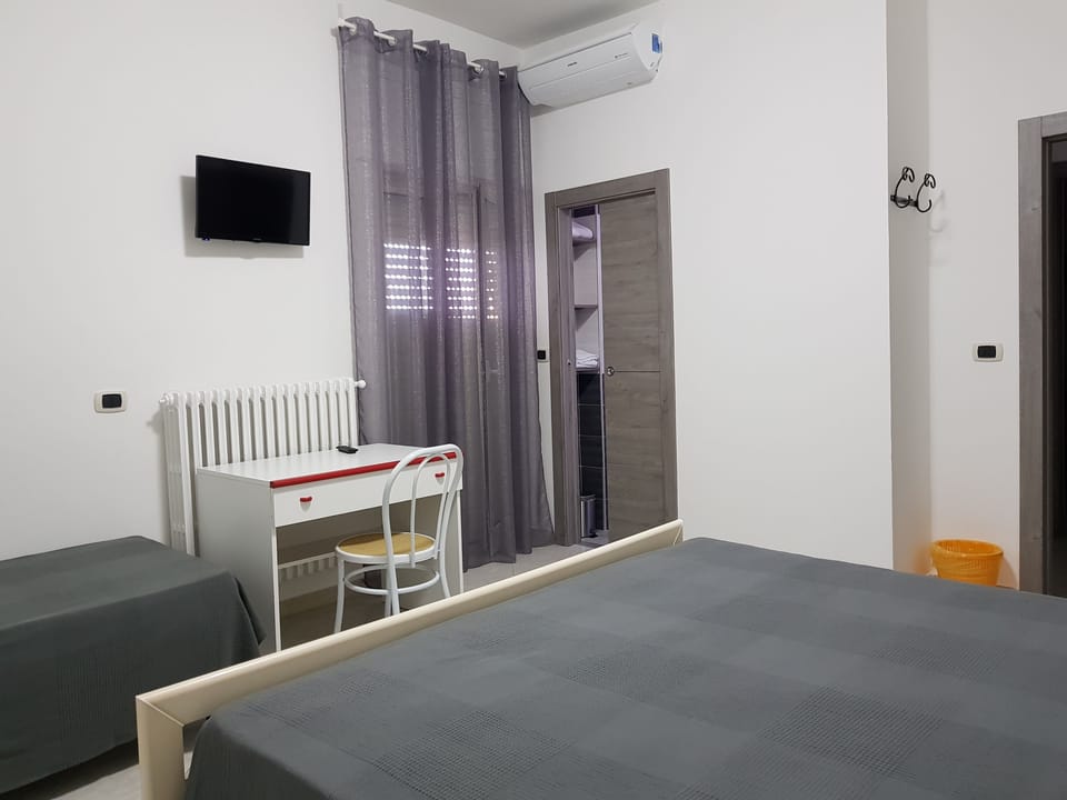 Exclusive Triple Room | Memory foam beds, desk, blackout drapes, free WiFi