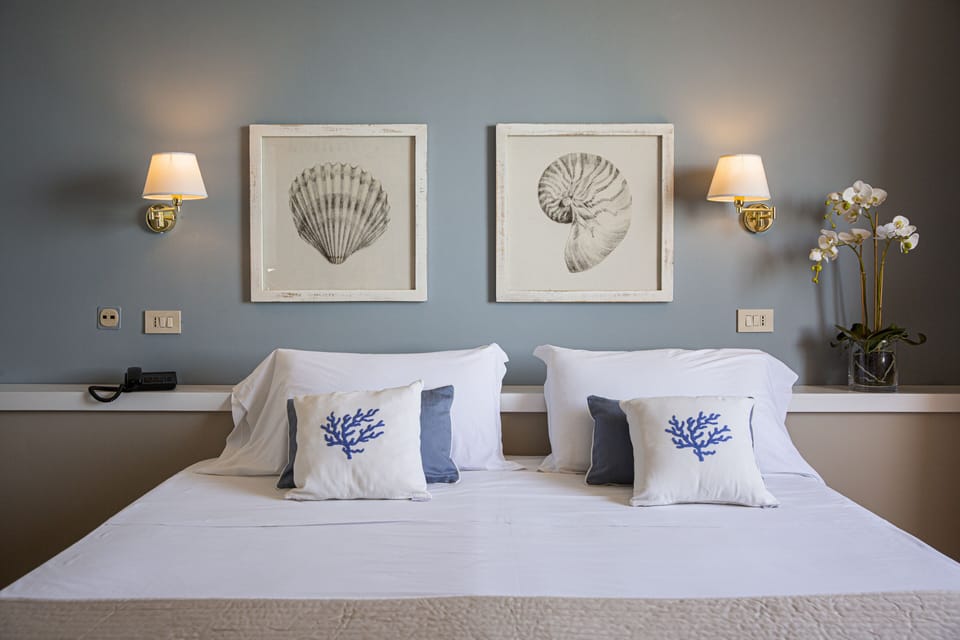 Superior Double or Twin Room, Sea View | Down comforters, minibar, in-room safe, desk