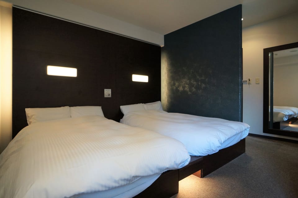 Down comforters, desk, free WiFi, bed sheets