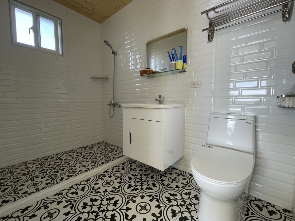 Family Quadruple Room, 1 Bedroom, Balcony | Bathroom | Free toiletries, hair dryer, slippers, towels