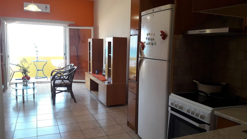 Family Apartment, 1 Bedroom, Beach View | Living area | Flat-screen TV