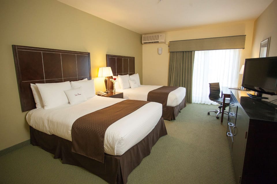 Premium bedding, down comforters, in-room safe, desk