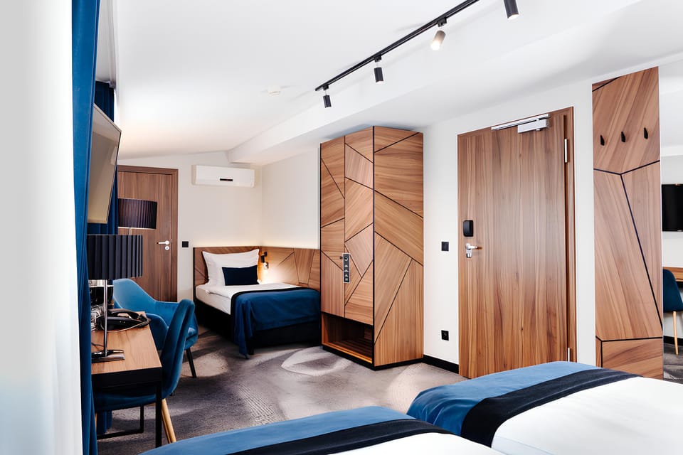 Premium Triple Room, 1 Bedroom | Hypo-allergenic bedding, in-room safe, desk, laptop workspace