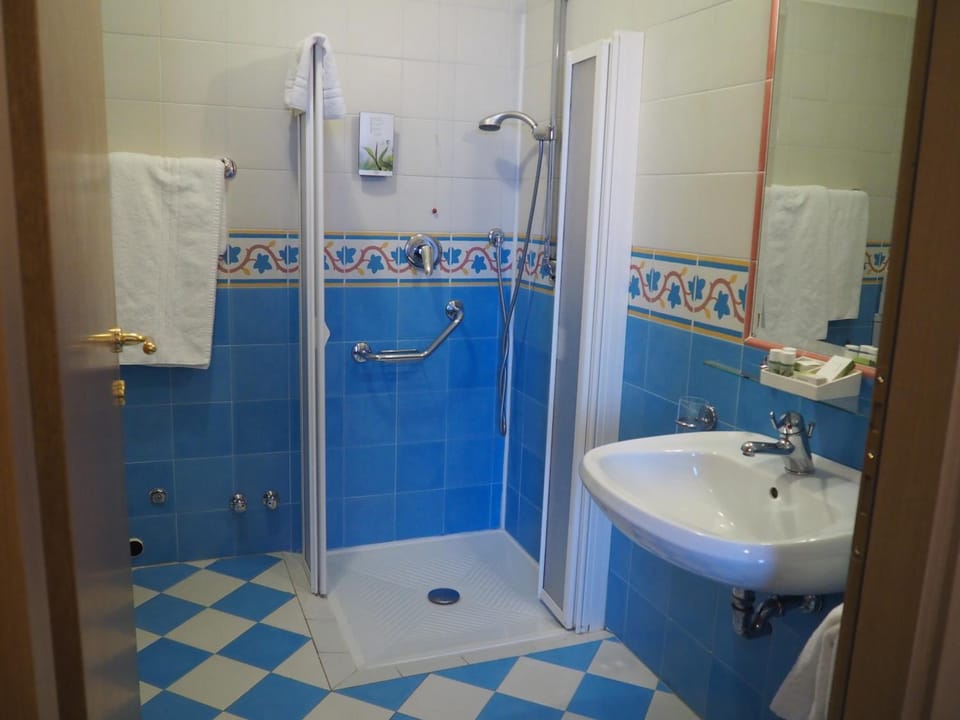 Shower, free toiletries, hair dryer, towels