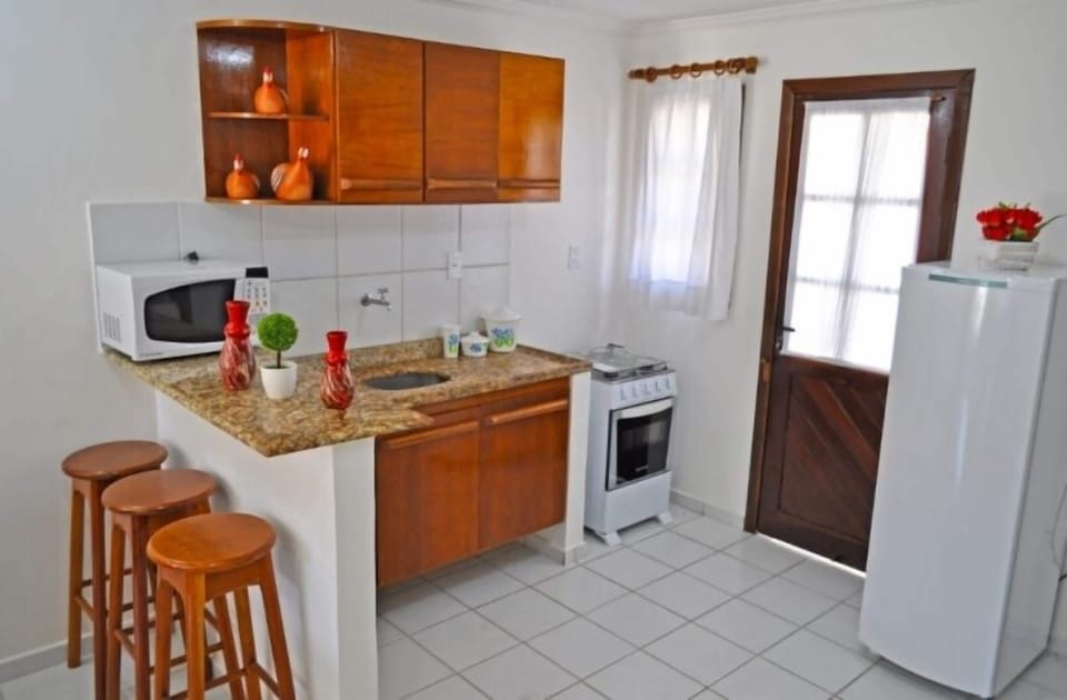 Fridge, microwave, stovetop, cookware/dishes/utensils