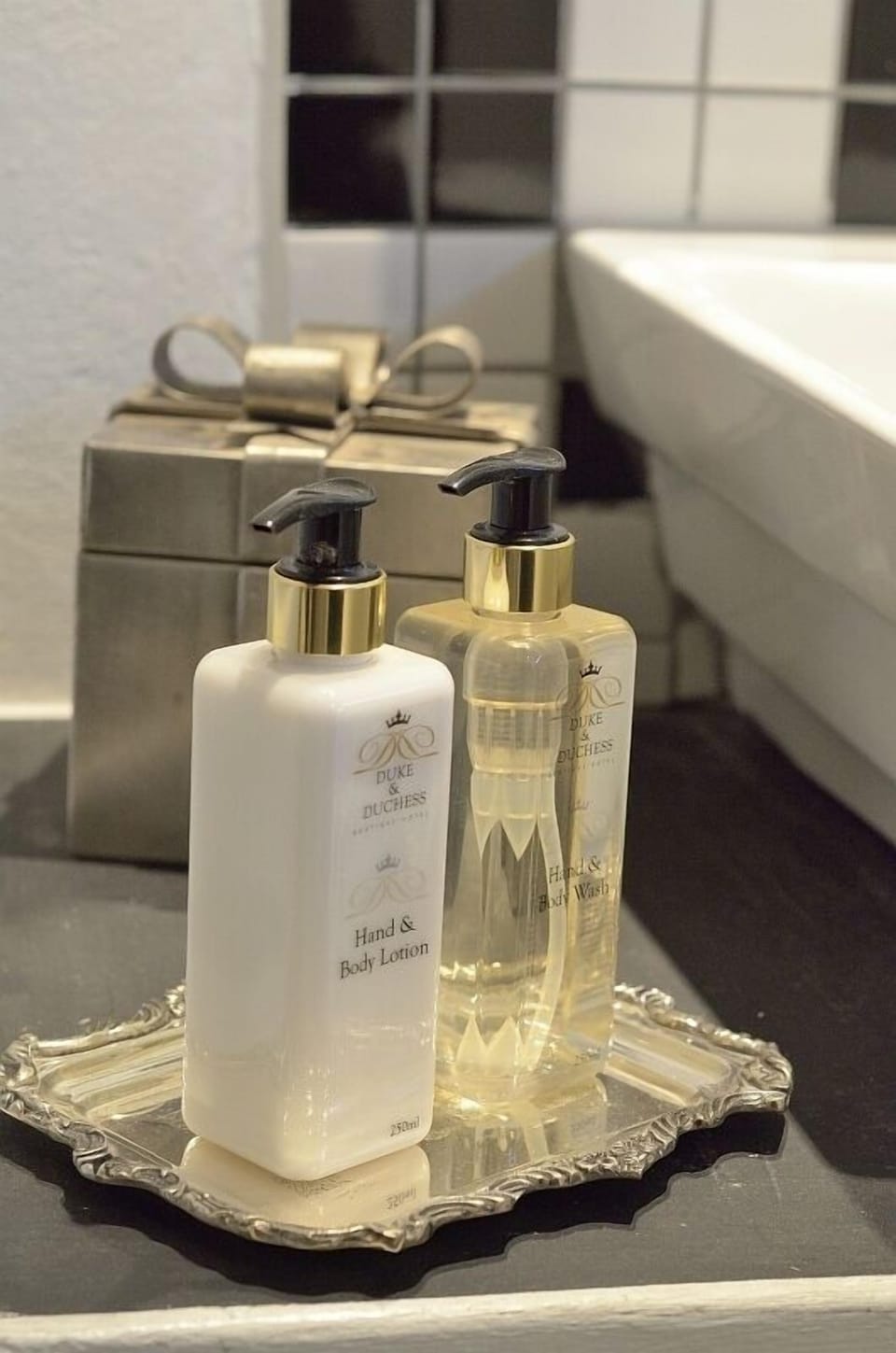 Designer toiletries, hair dryer, bathrobes, towels
