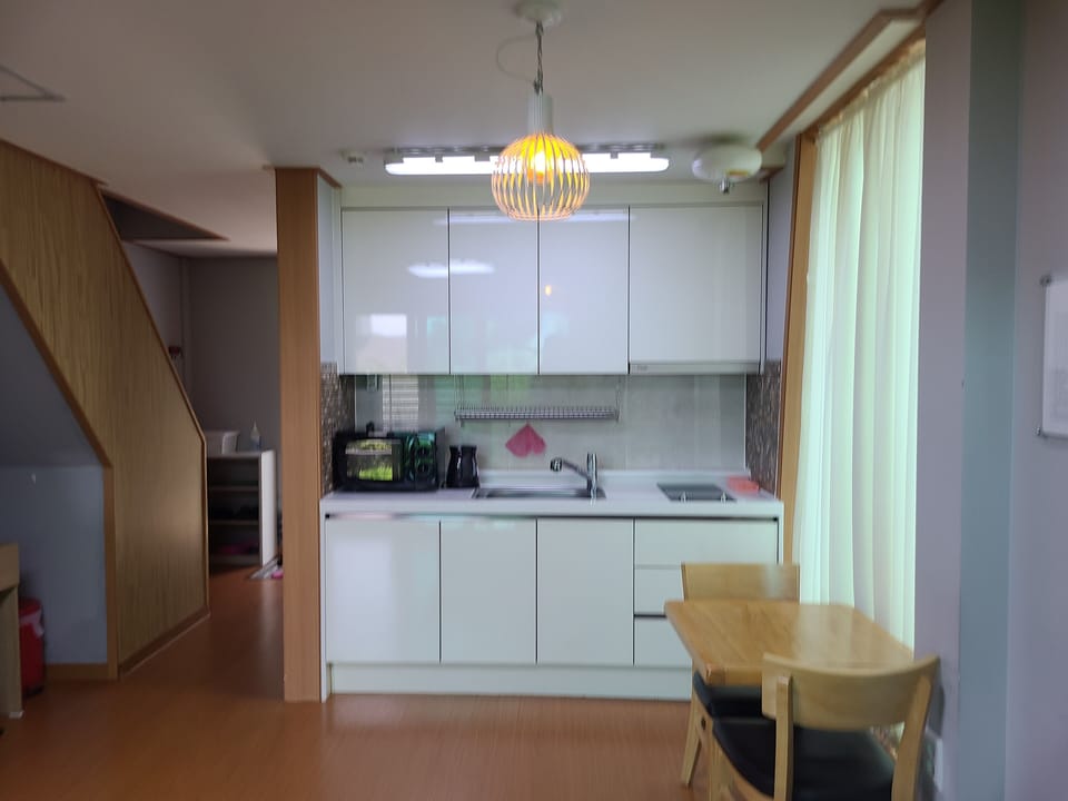 Duplex | Private kitchen | Full-size fridge, stovetop, rice cooker, cookware/dishes/utensils