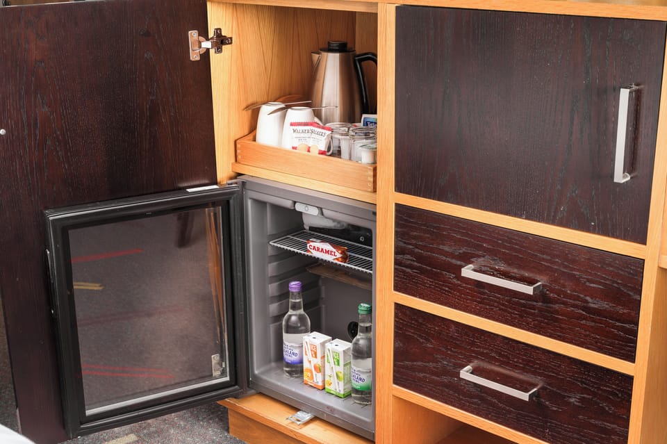 Suite, 1 King Bed with Sofa bed | 1 bedroom, in-room safe, desk, blackout drapes