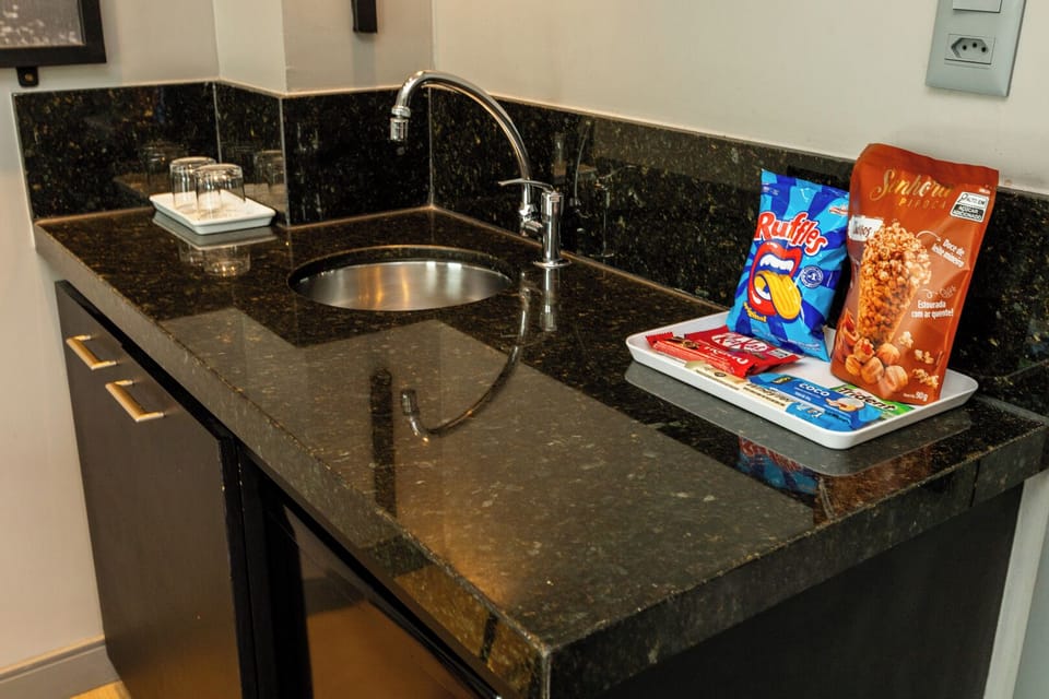 Superior Room | Minibar, in-room safe, desk, laptop workspace